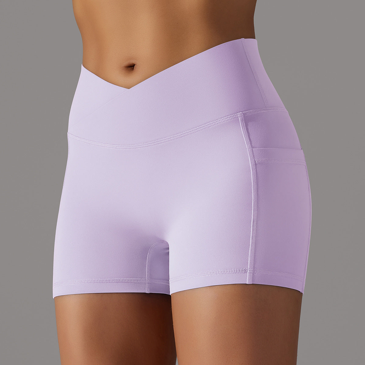 Pantalones cortos de yoga con diseño de bolsillo para teléfono, pantalones deportivos de fitness para mujer.