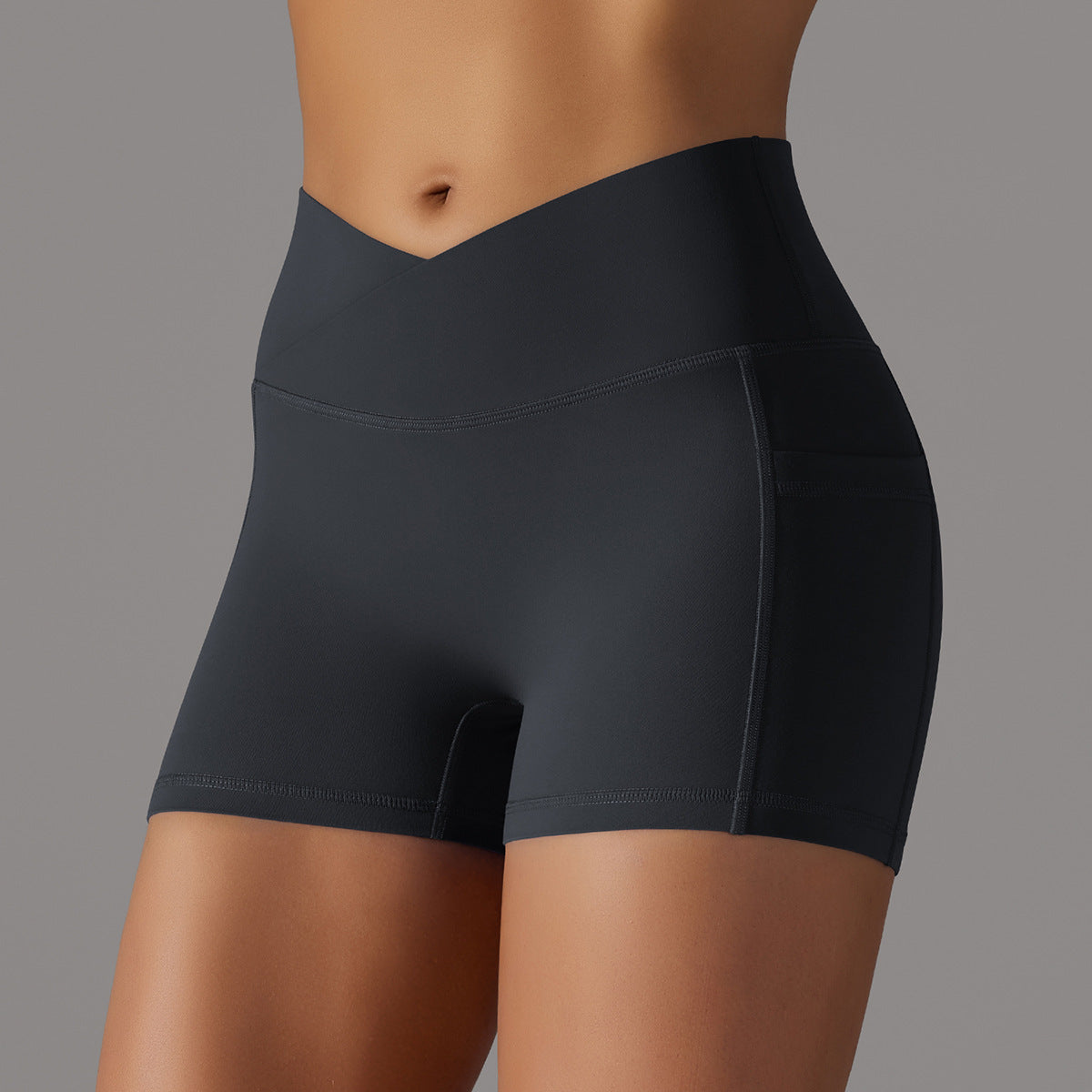 Pantalones cortos de yoga con diseño de bolsillo para teléfono, pantalones deportivos de fitness para mujer.