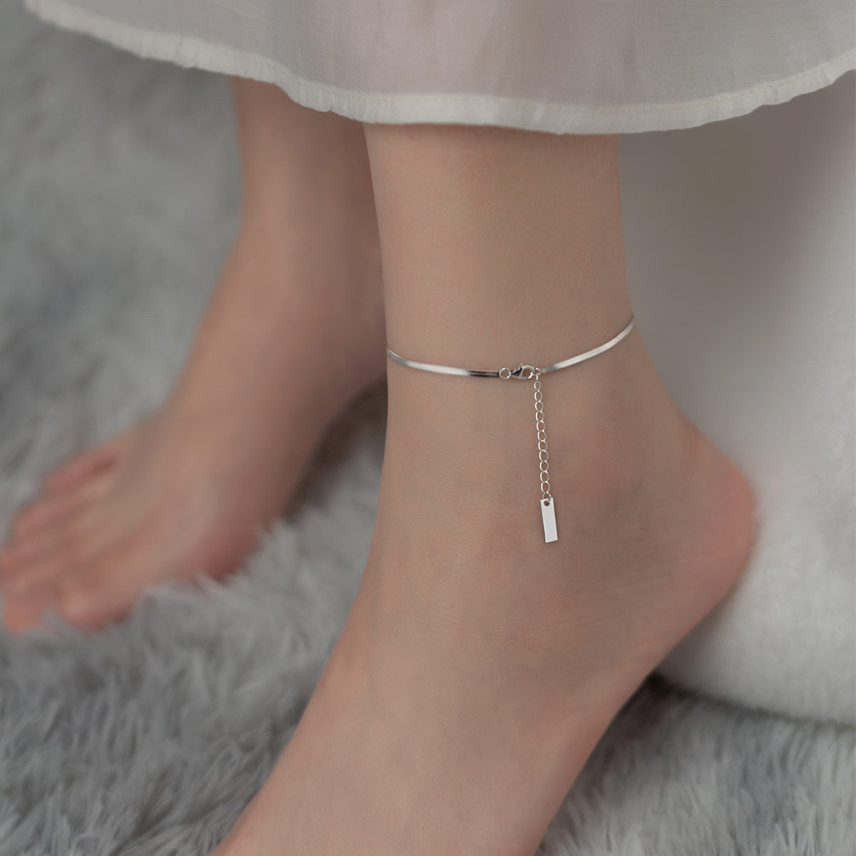 Tobillera de cadena única con diseño de serpiente y hueso plano de plata S925
