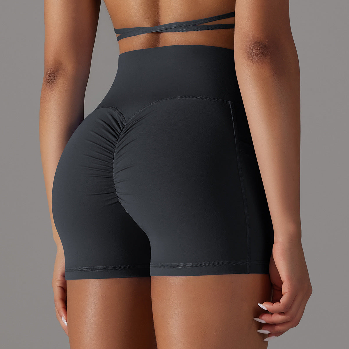 Pantalones cortos de yoga con diseño de bolsillo para teléfono, pantalones deportivos de fitness para mujer.